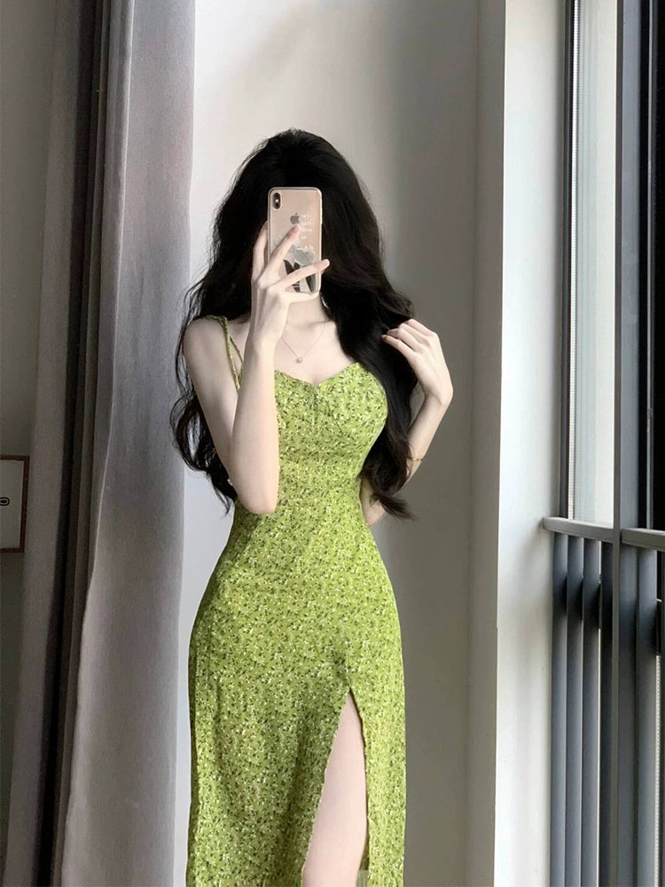 Fashion women's wear French Tea Break Floral Strap Dress Women's Spring and Summer Waist-Tight Temperament Pure Desire Seaside Holiday Split Long Skirt
