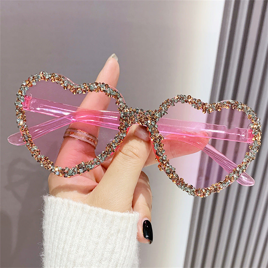 Women's fashion glasses 新款爱心连体镜片无框镶钻猫眼太阳镜跨境时尚女士墨镜桃心渐变色