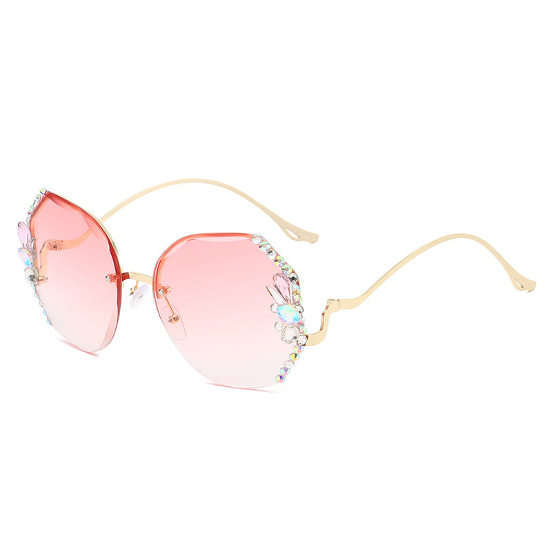 WWomen's fashion glasses 2024 跨境新款时尚镶钻无框切边太阳镜女潮款防紫外线显瘦太阳镜