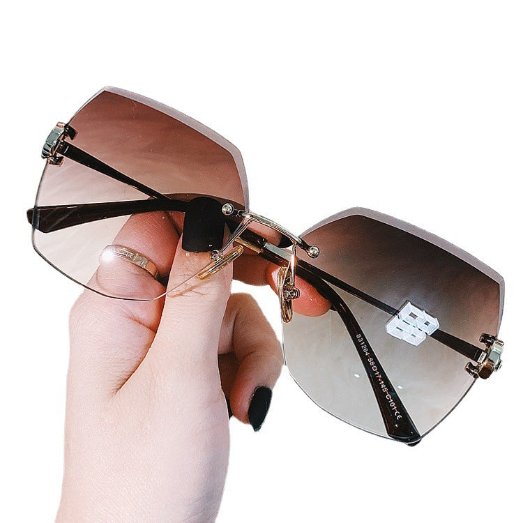 Women's fashion glasses 2024 新款跨境钻石切边女士太阳镜时尚眼镜开车驾驶防紫外线大墨镜