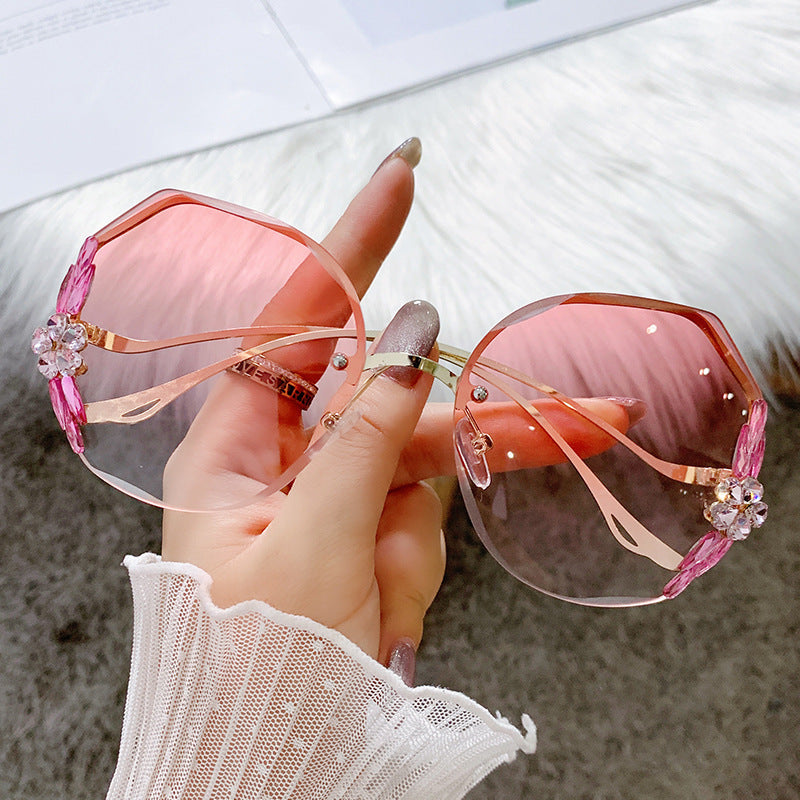 Women's fashion glasses 镶钻墨镜女夏潮无框钻石切边防紫外线太阳镜时尚优雅圆脸显瘦眼镜