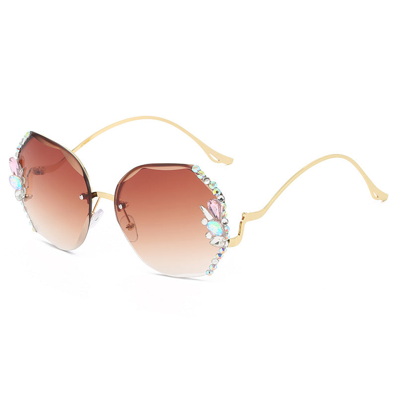 WWomen's fashion glasses 2024 跨境新款时尚镶钻无框切边太阳镜女潮款防紫外线显瘦太阳镜