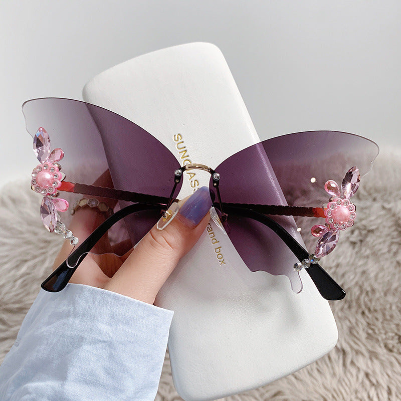Women's fashion glasses 欧美跨境新款舞会蝴蝶形状镶钻无框太阳镜女夸张墨镜女圆脸大脸