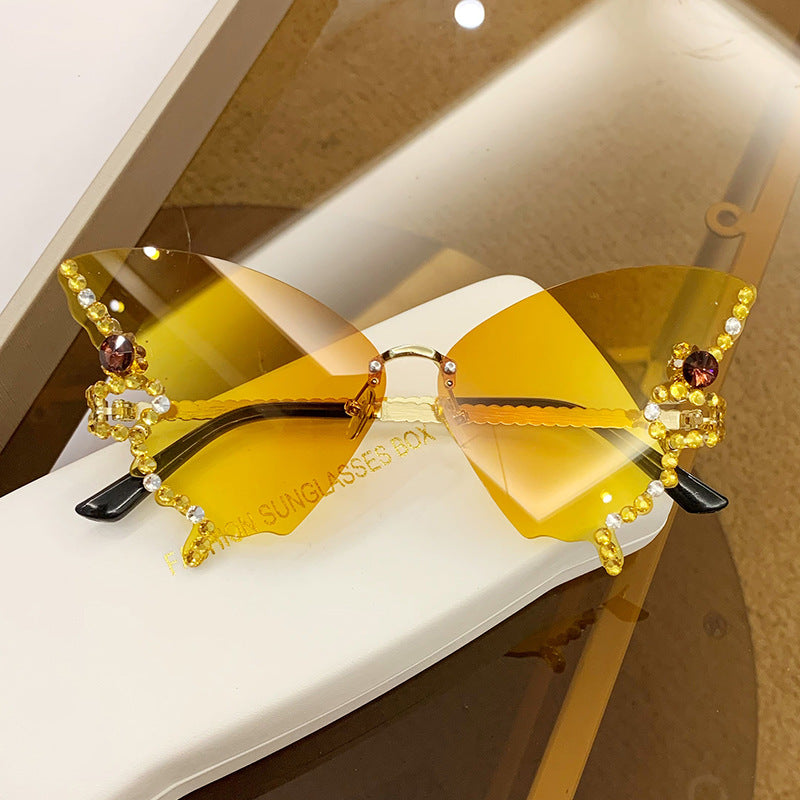 Women's fashion glasses 跨境2023新款蝴蝶形状镶钻无框太阳镜女欧美时尚个性夸张墨镜舞会
