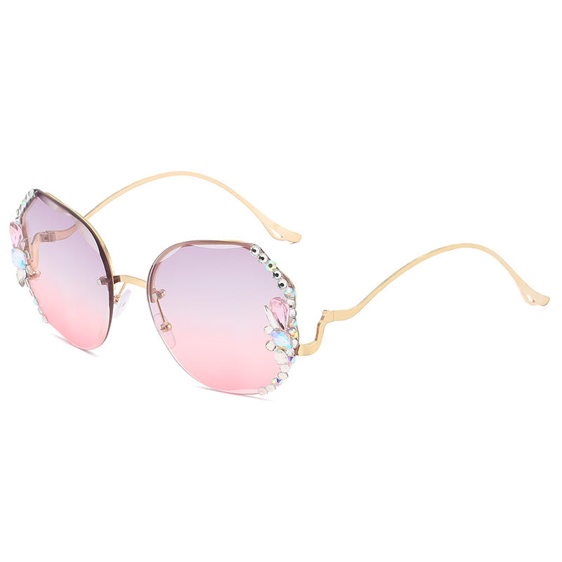 WWomen's fashion glasses 2024 跨境新款时尚镶钻无框切边太阳镜女潮款防紫外线显瘦太阳镜