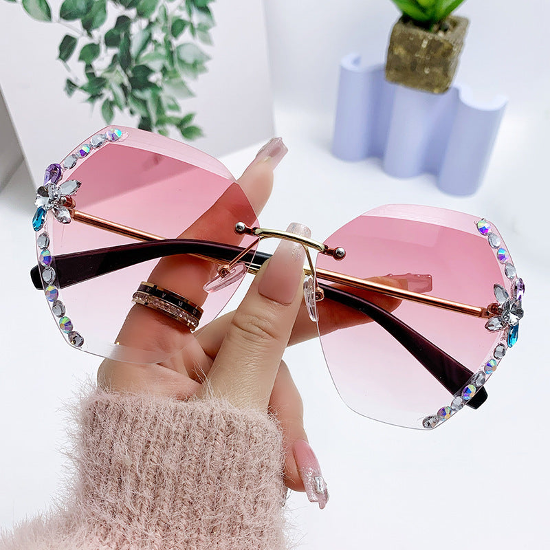Women's fashion glasses 跨境新款水钻墨镜女显瘦无框切边太阳镜网红潮款防紫外线韩版眼镜