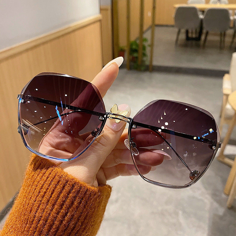 Women's fashion glasses 2024 新款跨境大框金属无框太阳镜欧美多边形切边海洋片女士墨镜