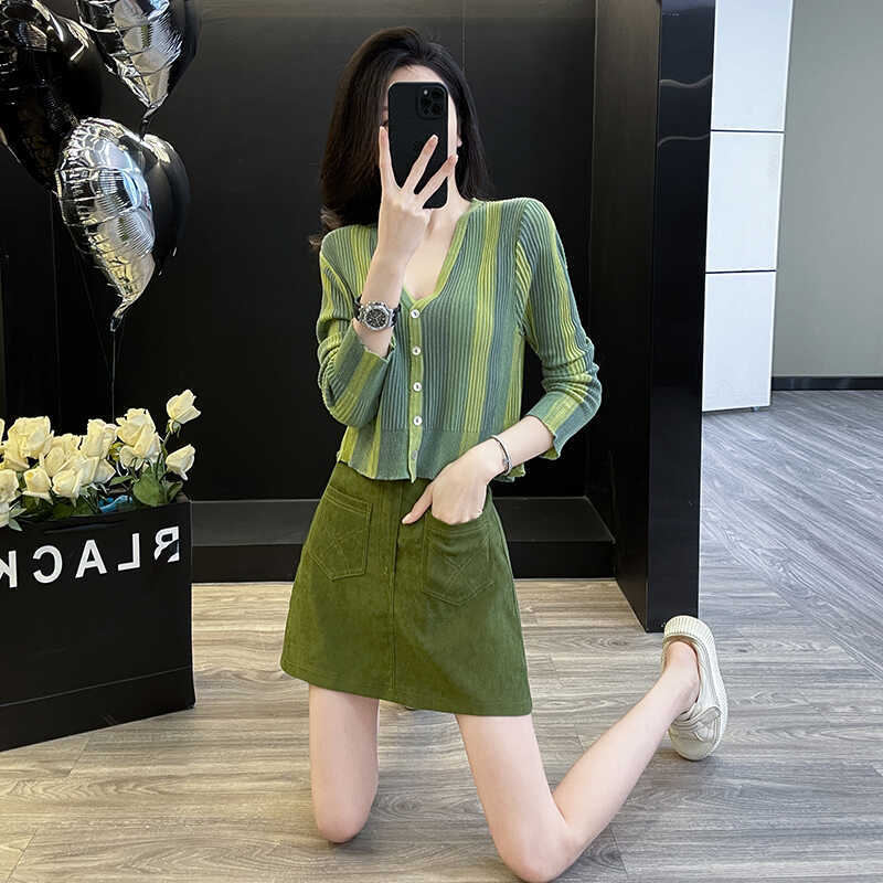 Dopamine dress Free shipping Tattoo Korean version of dopamine wear fashion temperament autumn new women's clothing knitted cardigan long sleeve green high waist short skirt tide