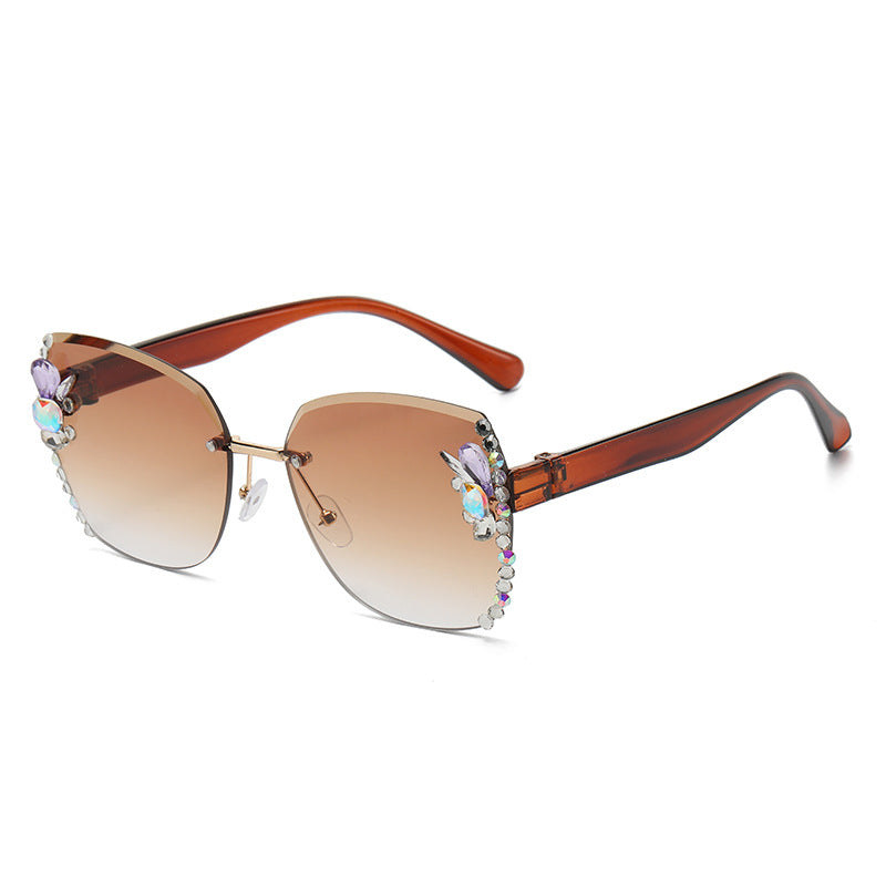 Women's fashion glasses 2023跨境欧美无框切边镶钻太阳镜女防紫外线墨镜海洋片遮阳眼镜