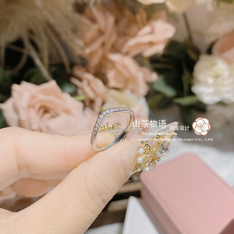 山茶仿莫桑石戒指女简约百搭ins风食指戒 韩版小众设计V形排钻戒