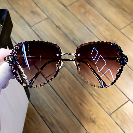 Women's fashion glasses 2021跨境网红ins墨镜女镶钻韩版潮个性水晶无框防紫外线太阳镜女