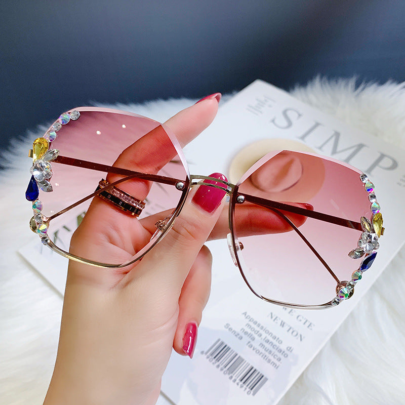 Women's fashion glasses 2022新款跨境镶钻切边女士太阳镜ins风无框女式墨镜厂家现货