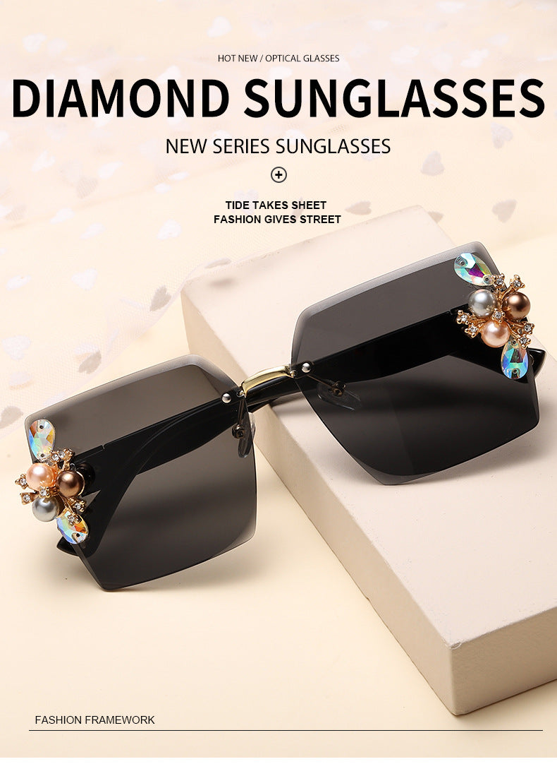 Women's fashion glasses 2023跨境无框切边镶珍珠太阳镜女防紫外线墨镜夏季防晒高级感显瘦