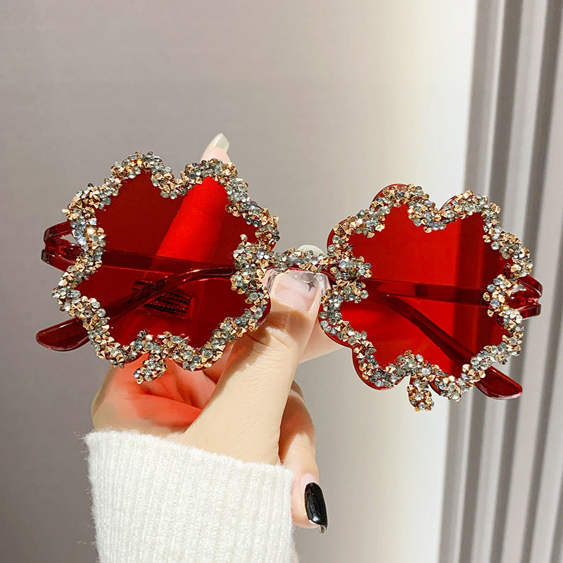 Women's fashion glasses 新款跨境镶钻透明果冻色四叶草太阳镜男女士墨镜欧形连体水钻眼镜