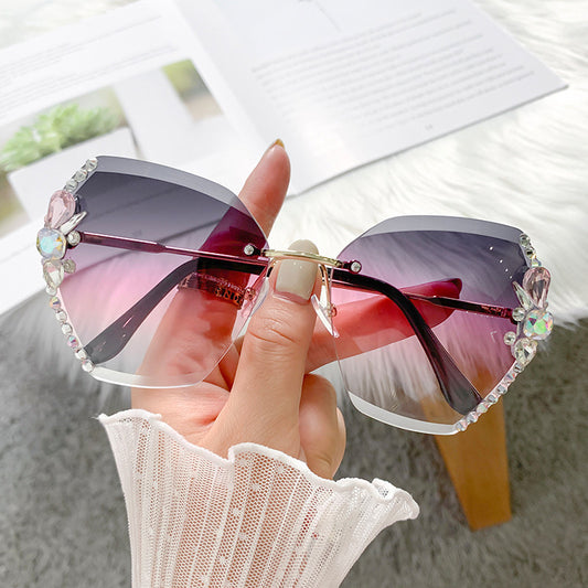 Women's fashion glasses 定制加工跨境无框多边形镶钻花朵太阳镜女圆脸大脸 不规则墨镜女
