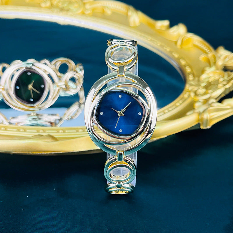 Fashion women's watchCross-Border Foreign Trade Women's Quartz Watch Hollow Flower Rhinestone Bracelet Watch Special Interest Light Luxury All-Match Women's Watch Wholesale