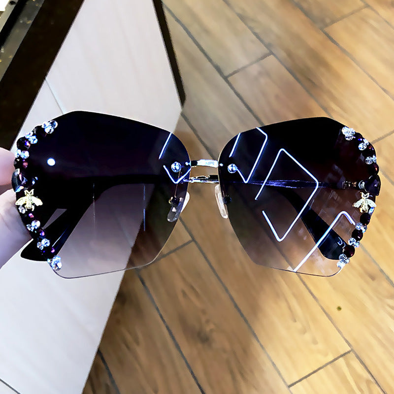 Women's fashion glasses 网红带钻墨镜女2022小蜜蜂水钻无框大脸显瘦太阳眼镜女防紫外线