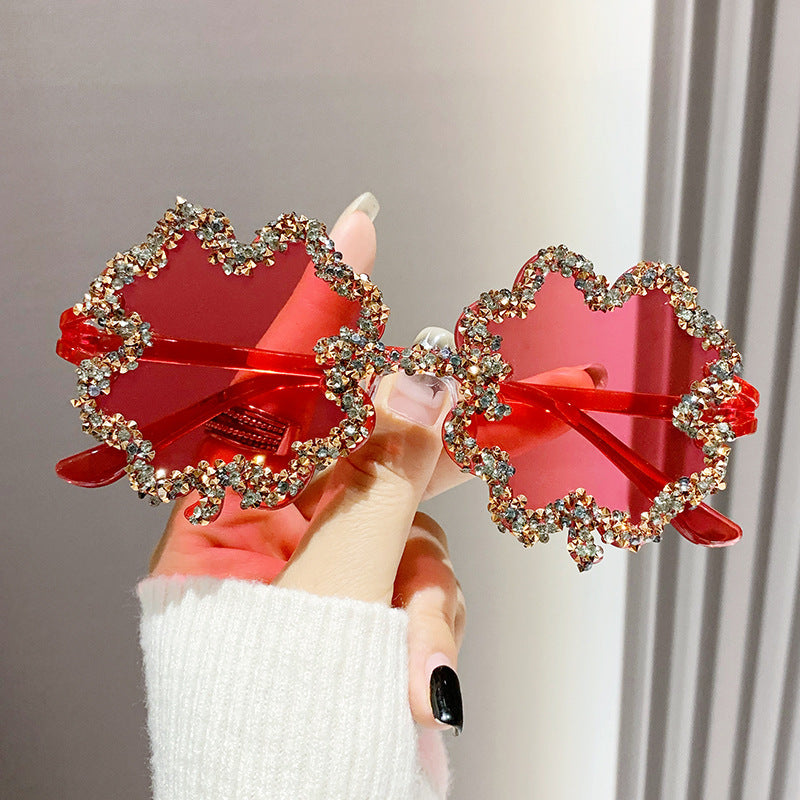 Women's fashion glasses 新款跨境镶钻透明果冻色四叶草太阳镜男女士墨镜欧形连体水钻眼镜