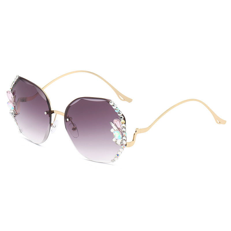 WWomen's fashion glasses 2024 跨境新款时尚镶钻无框切边太阳镜女潮款防紫外线显瘦太阳镜
