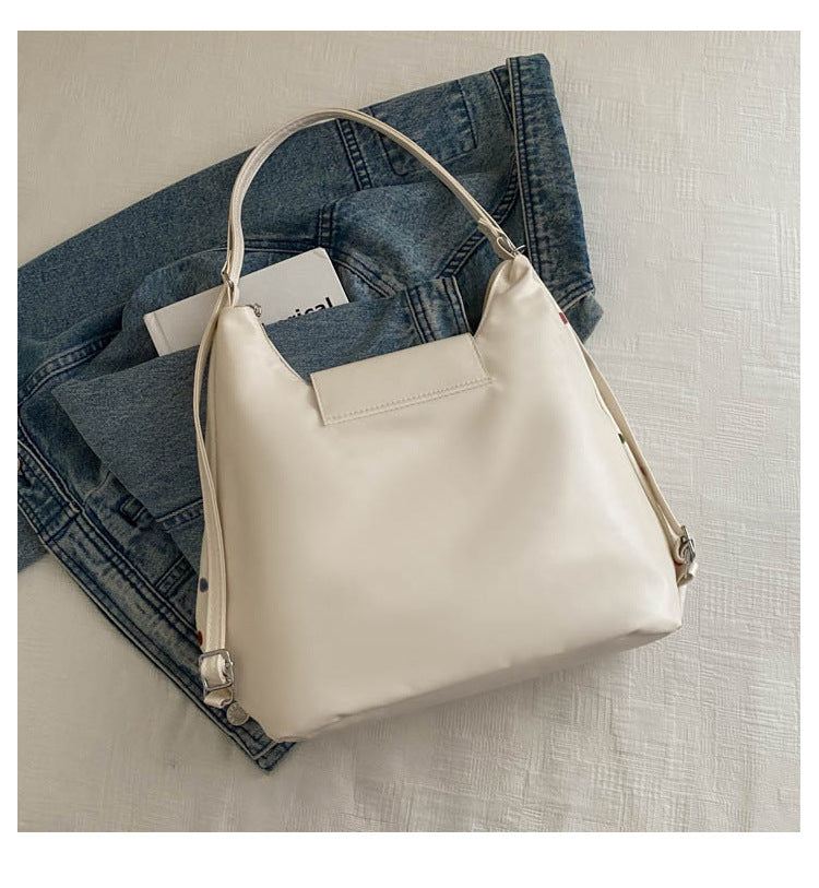 Dopamine Bag Free shipping Tattoo 2024 niche dopamine polka dot messenger bag women's new color dot shoulder bag commuting large-capacity backpack