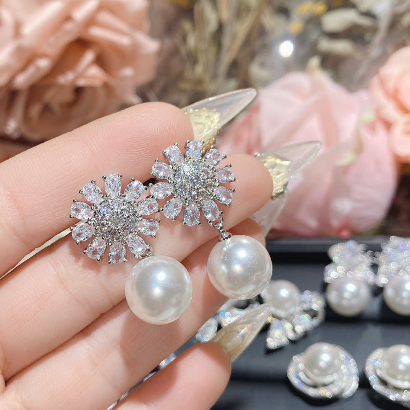 山茶新款轻奢名媛气质蝴蝶结珍珠耳饰 高级精致银针贝珠耳环批发