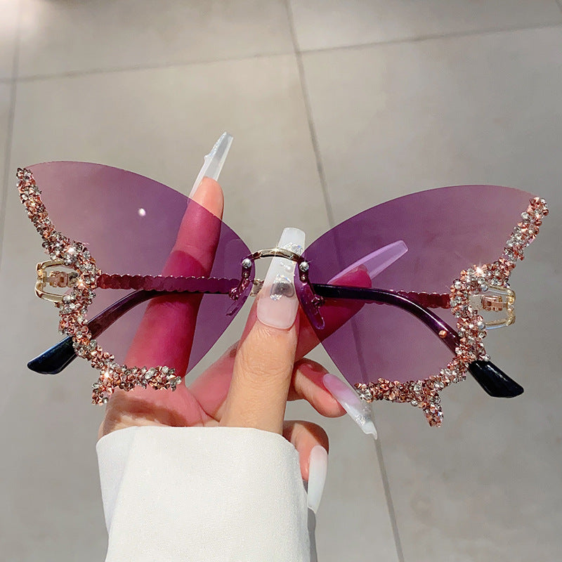 Women's fashion glasses 欧美跨境新款蝴蝶镶碎钻无边框太阳镜复古时尚个性穿搭高级感墨镜