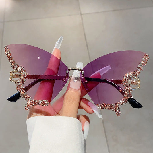 Women's fashion glasses 欧美跨境新款蝴蝶镶碎钻无边框太阳镜复古时尚个性穿搭高级感墨镜