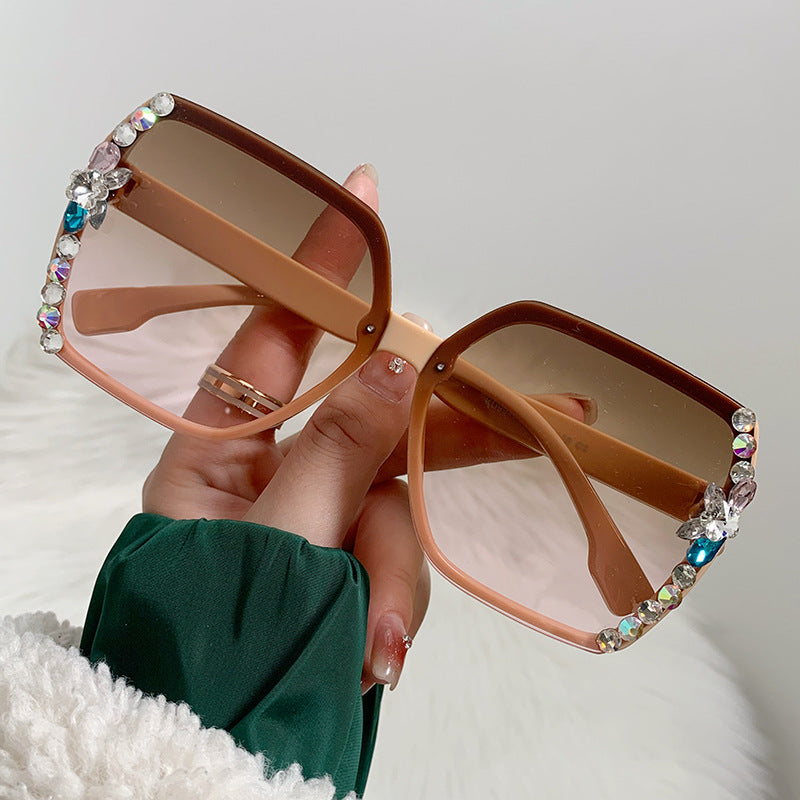 Women's fashion glasses 镶钻墨镜女款韩版潮无框水晶切边太阳眼镜女士防紫外线镶钻太阳镜