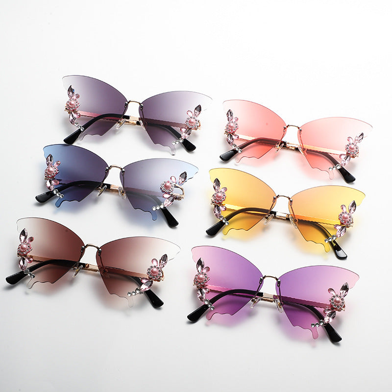 Women's fashion glasses 欧美跨境新款舞会蝴蝶形状镶钻无框太阳镜女夸张墨镜女圆脸大脸