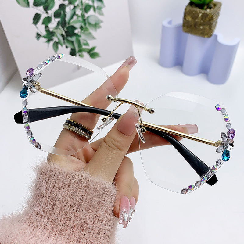 Women's fashion glasses 跨境新款水钻墨镜女显瘦无框切边太阳镜网红潮款防紫外线韩版眼镜