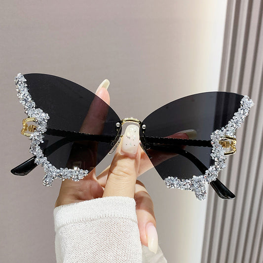 Women's fashion glasses 跨境2024新款蝴蝶形状镶钻无框太阳镜女时尚个性夸张墨镜欧美网红