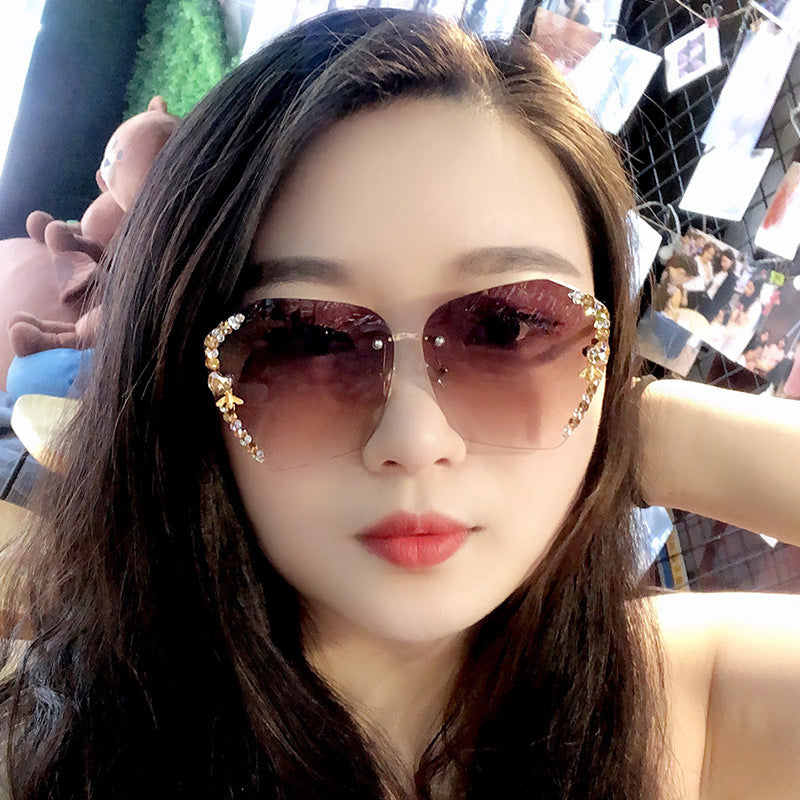Women's fashion glasses 网红带钻墨镜女2022小蜜蜂水钻无框大脸显瘦太阳眼镜女防紫外线