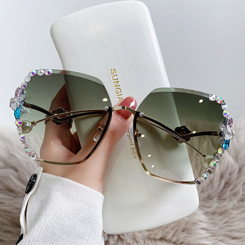 Women's fashion glasses 2022新款珍珠水钻防晒防紫外线墨镜网红ins圆脸太阳镜镶钻潮