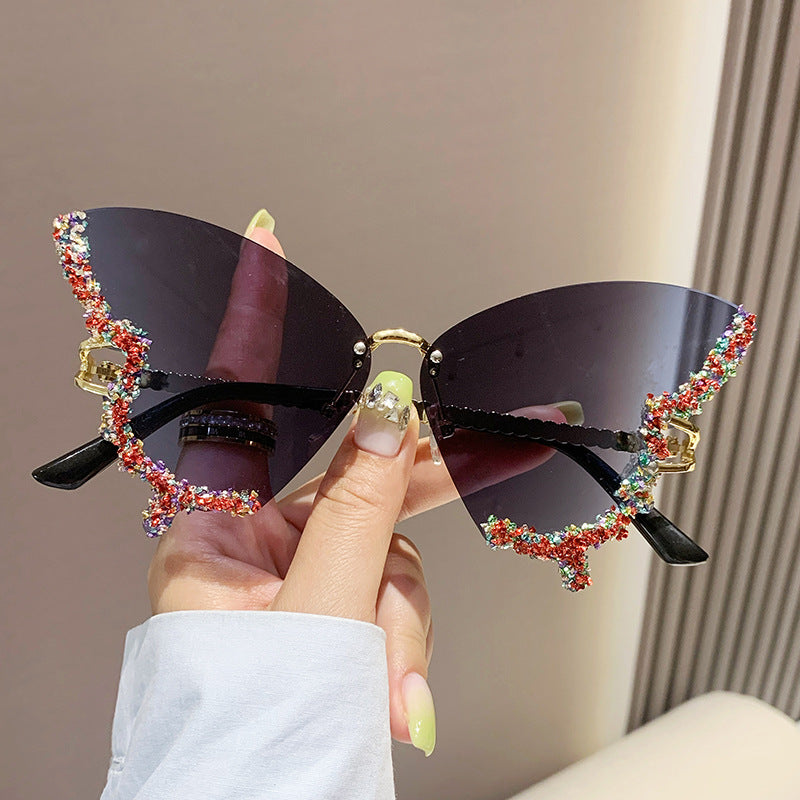 Women's fashion glasses 新款跨境大框蝴蝶镶钻无框太阳镜女ins时尚个性拍照墨镜夸张舞会