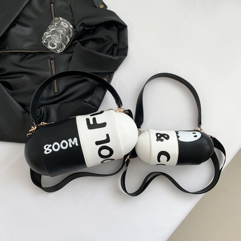 Dopamine Bag Free shipping Tattoo Women's bag new dopamine contrasting color trend cylindrical capsule bag European and American style personality funny single shoulder oblique span bag