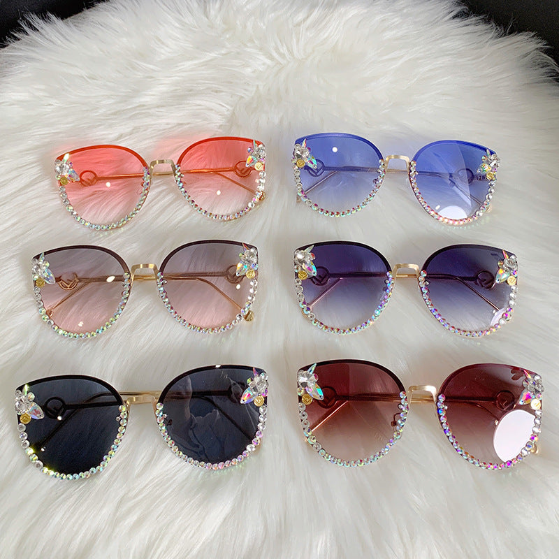 Women's fashion glasses 2024 新款镶钻猫眼复古太阳镜大框墨镜女士金属镜腿镂空跨境遮阳镜
