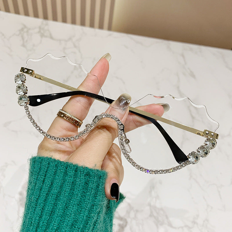 Women's fashion glasses 欧美镶钻大框架跨境水钻墨镜女异形波浪切边眼镜防晒显瘦太阳镜