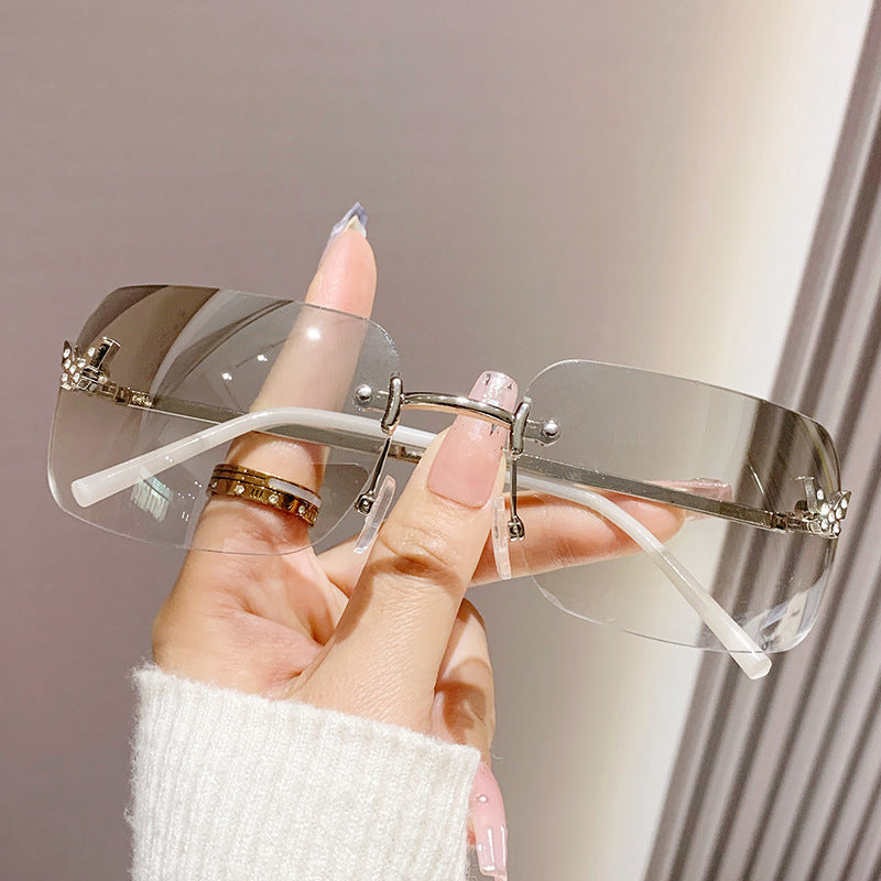 Women's fashion glasses 2023新款无框切边太阳镜女海洋片方形镶钻蝴蝶时尚渐变色墨镜街拍